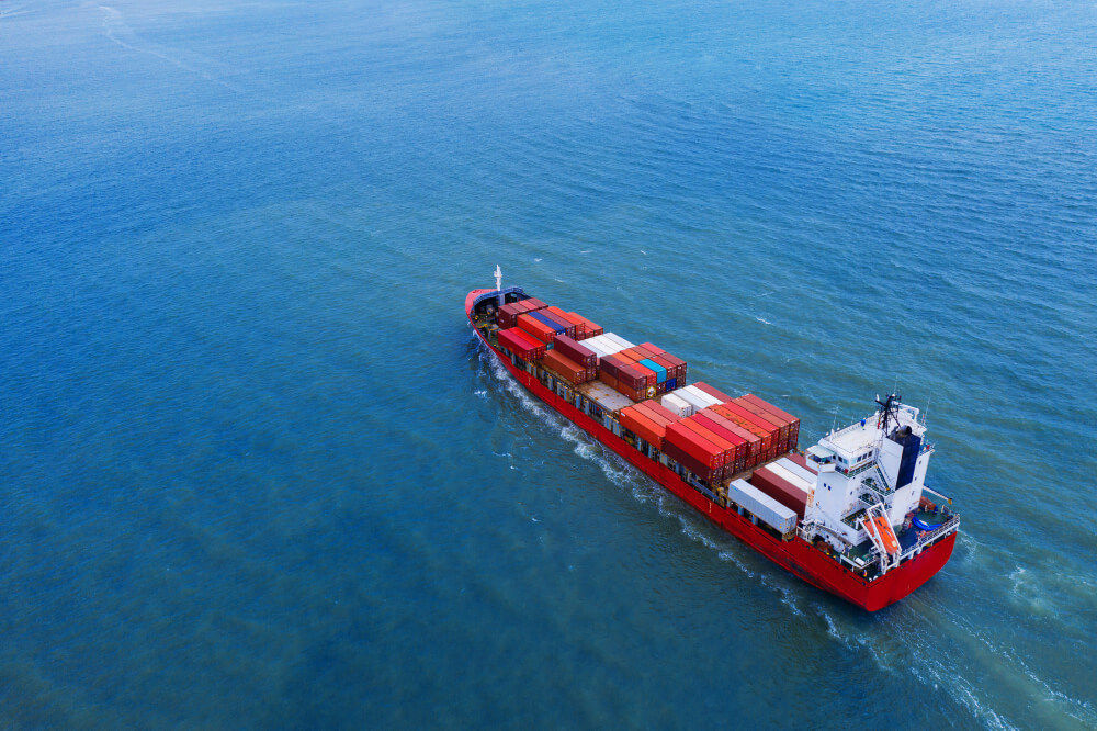 Aerial View Of Container Cargo Ship In Sea